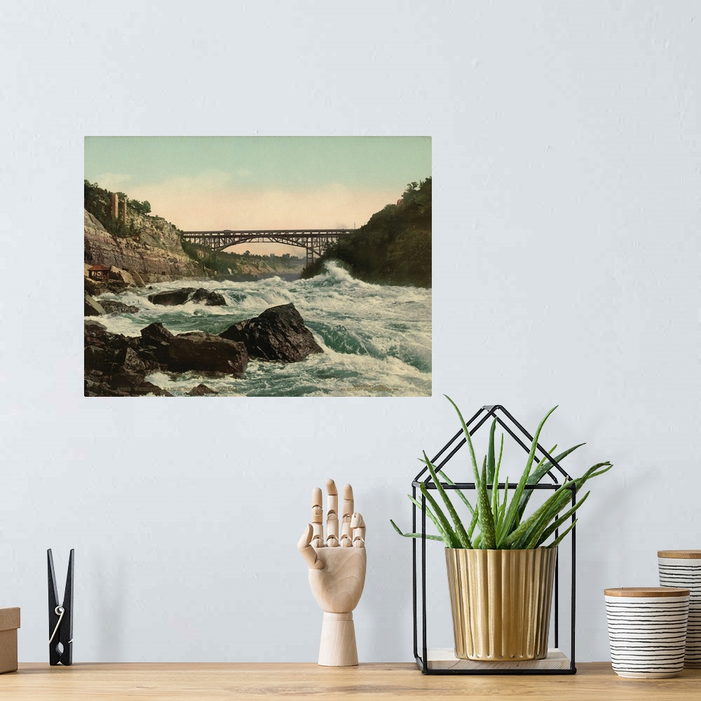 A bohemian room featuring Hand colored photograph of whirlpool rapids, looking up Niagara.