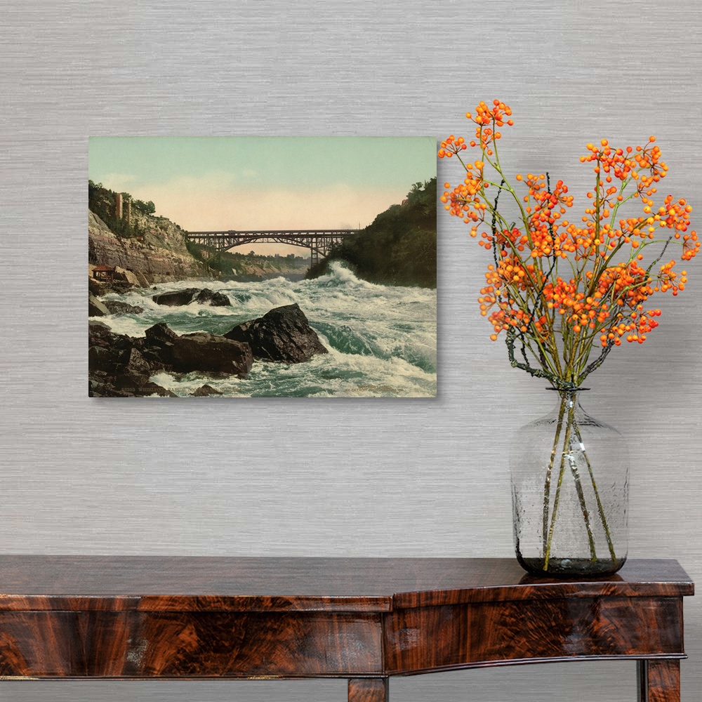 A traditional room featuring Hand colored photograph of whirlpool rapids, looking up Niagara.