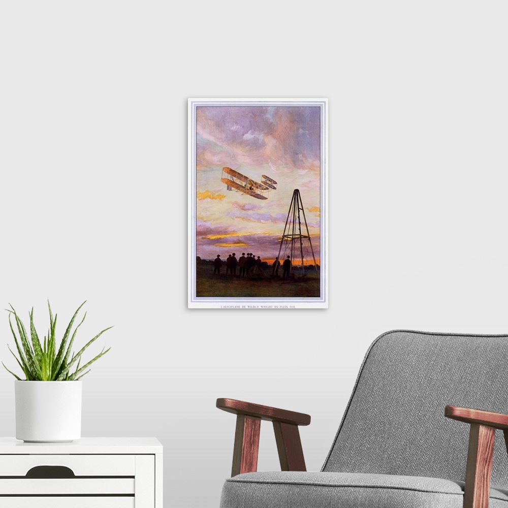 A modern room featuring Big, vertical, vintage wall hanging of Wilbur Wright Aviation.  A group of people look upward at ...