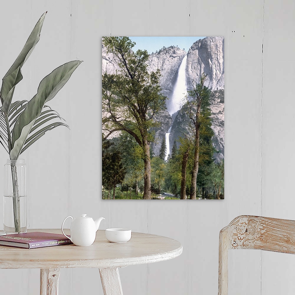 A farmhouse room featuring Big, vertical photograph of Yosemite Falls seen through the trees in Yosemite Valley, California.