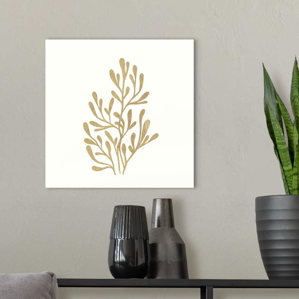 A modern room featuring Minimalist artwork of a golden seaweed outline on off-white.