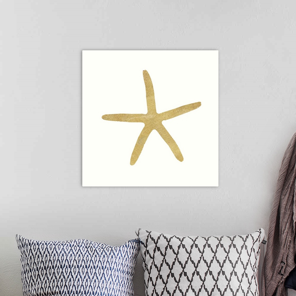 A bohemian room featuring Minimalist artwork of a golden starfish outline on off-white.