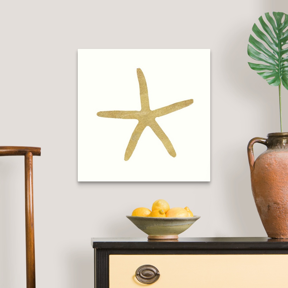 A traditional room featuring Minimalist artwork of a golden starfish outline on off-white.