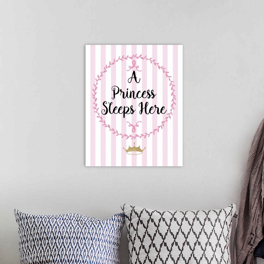 A bohemian room featuring Pink nursery art with black handlettered text and a gold crown.