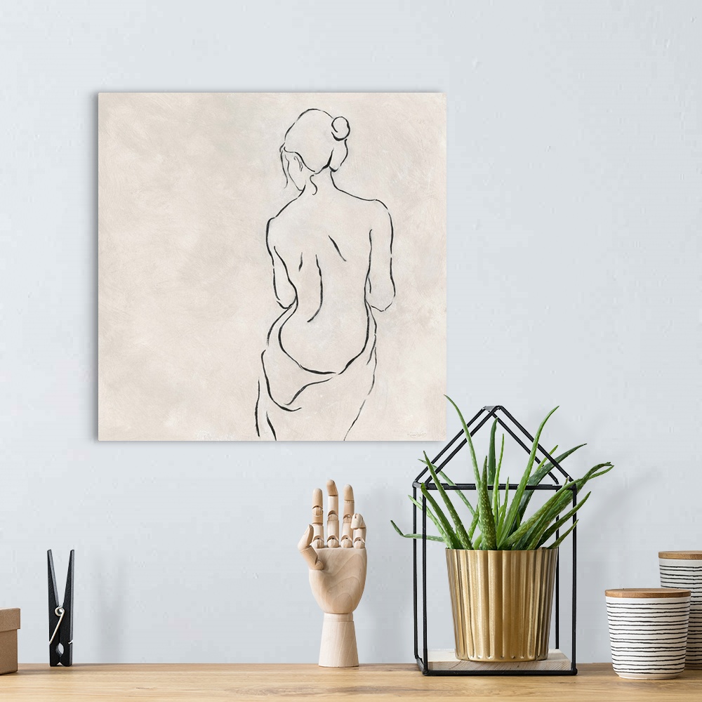 A bohemian room featuring Minimalist artwork of a nude female figure.