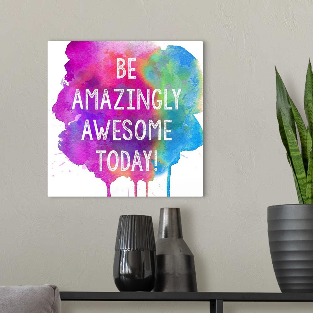 A modern room featuring "Be Amazingly Awesome Today!" inspiring typography on a colorful paint splattered background.