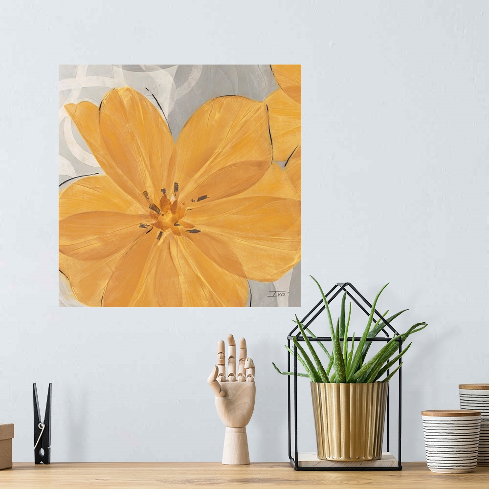 A bohemian room featuring Decorative artwork of a cheerful orange flower on a grey background.