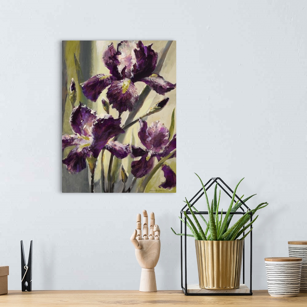 A bohemian room featuring Contemporary painting of three purple iris flowers.
