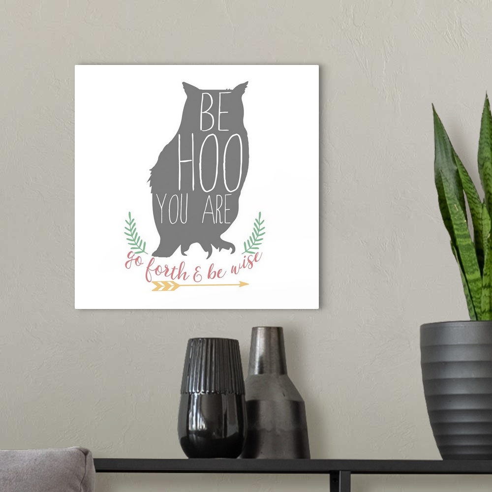 A modern room featuring Playful typography on a silhouette of an owl reading "Be Hoo You Are" and "Go Fourth and Be Wise"...