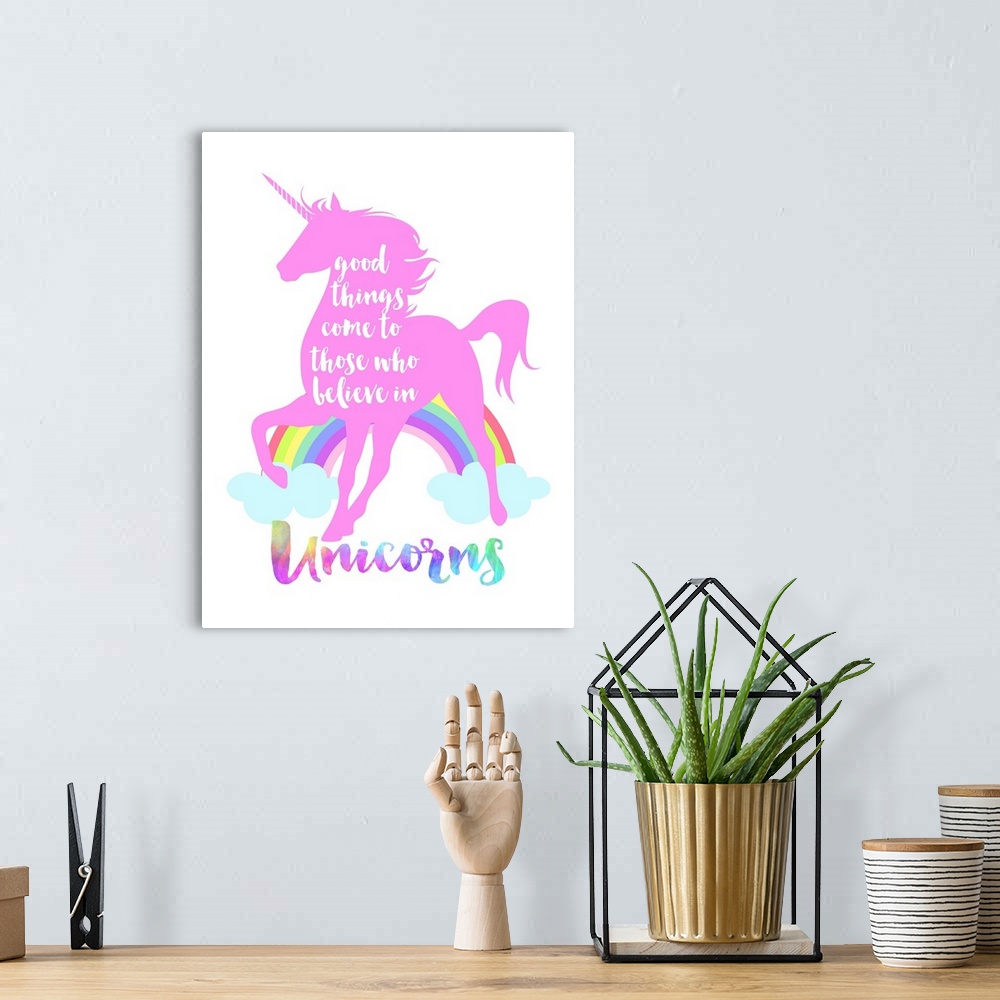 A bohemian room featuring "Good Things Come To Those Who Believe in Unicorns"