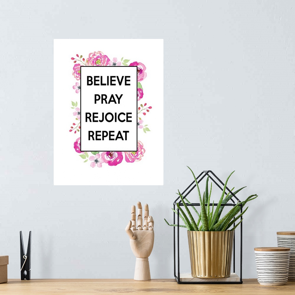 A bohemian room featuring "Believe, Pray, Rejoice, Repeat"