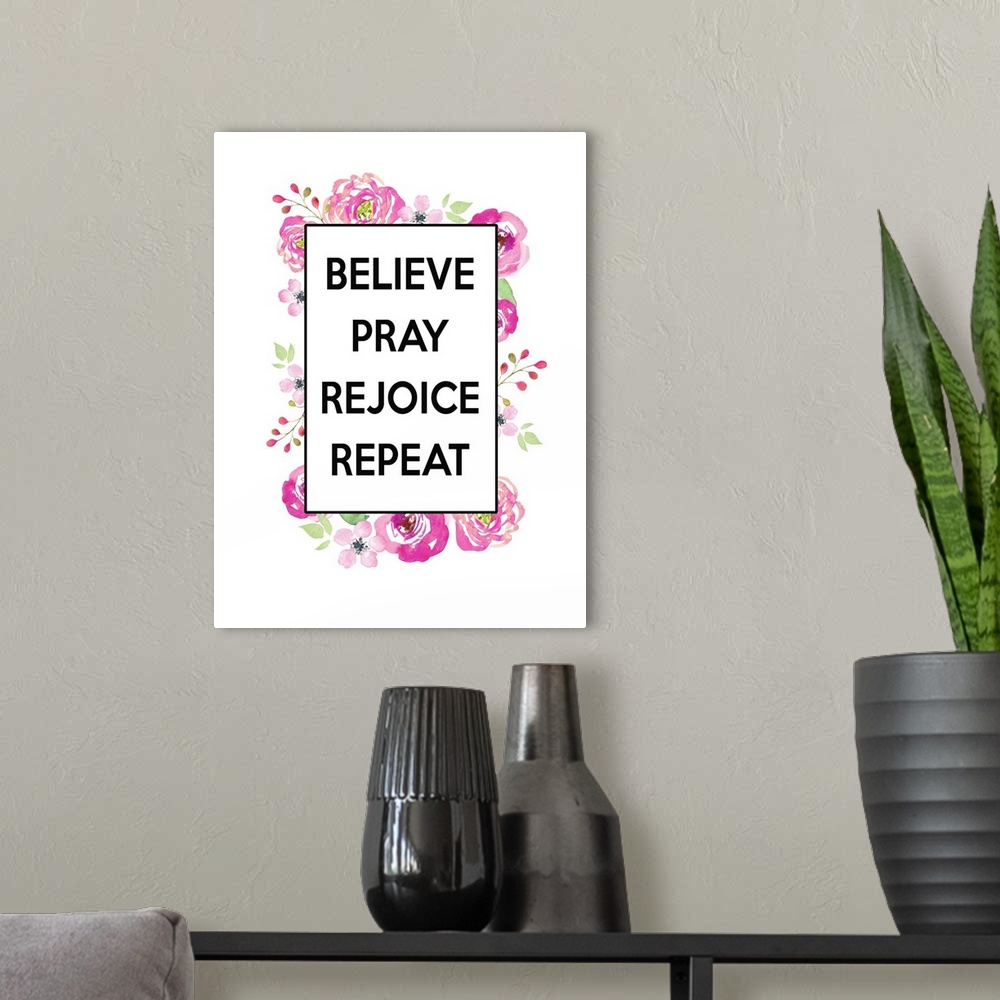 A modern room featuring "Believe, Pray, Rejoice, Repeat"