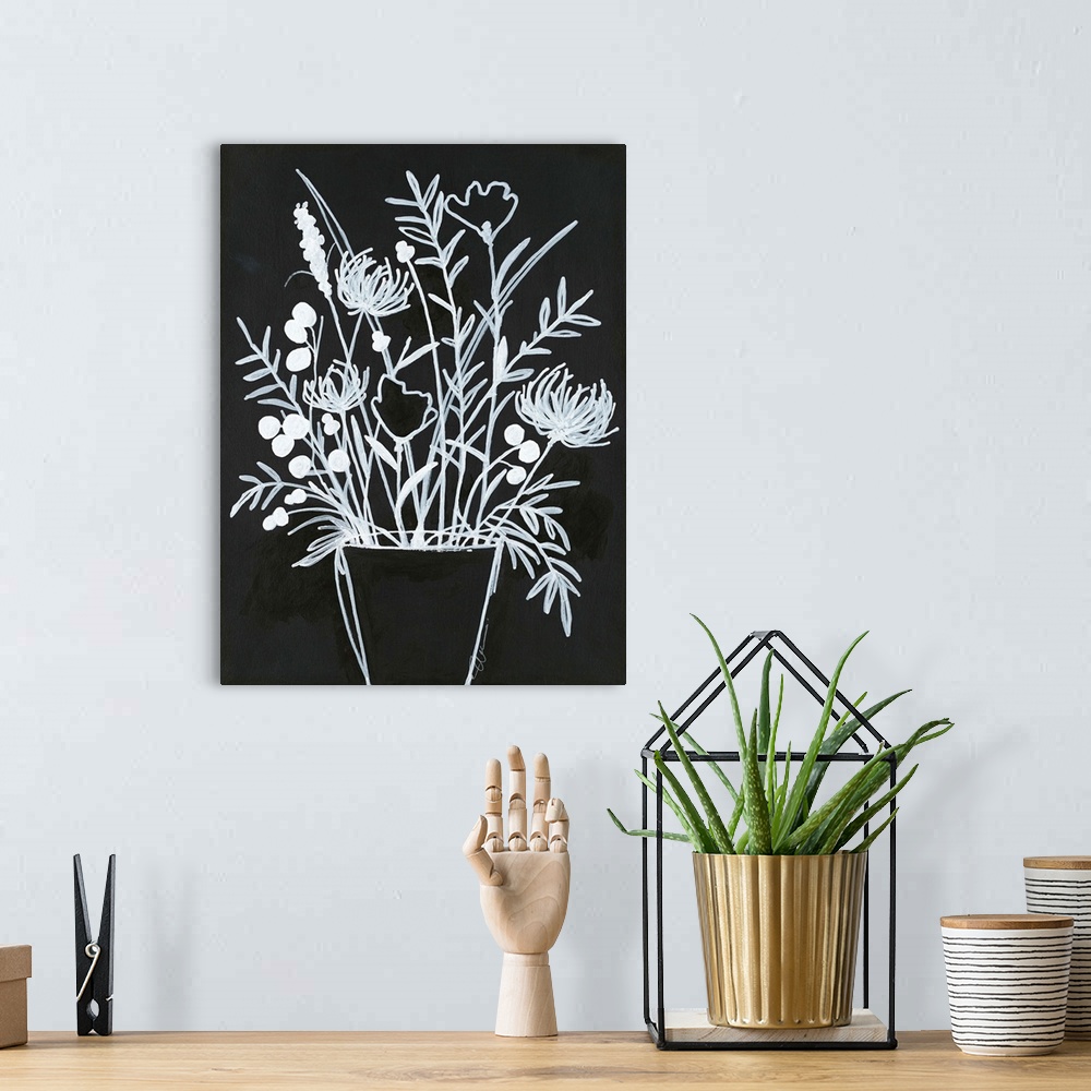 A bohemian room featuring Simple black and white illustration of long-stemmed flowers in a vase.
