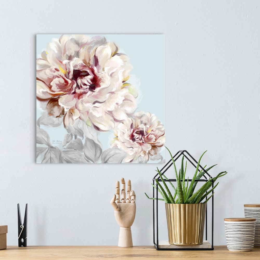 A bohemian room featuring Home decor artwork of soft pink peonies against a pale blue background.