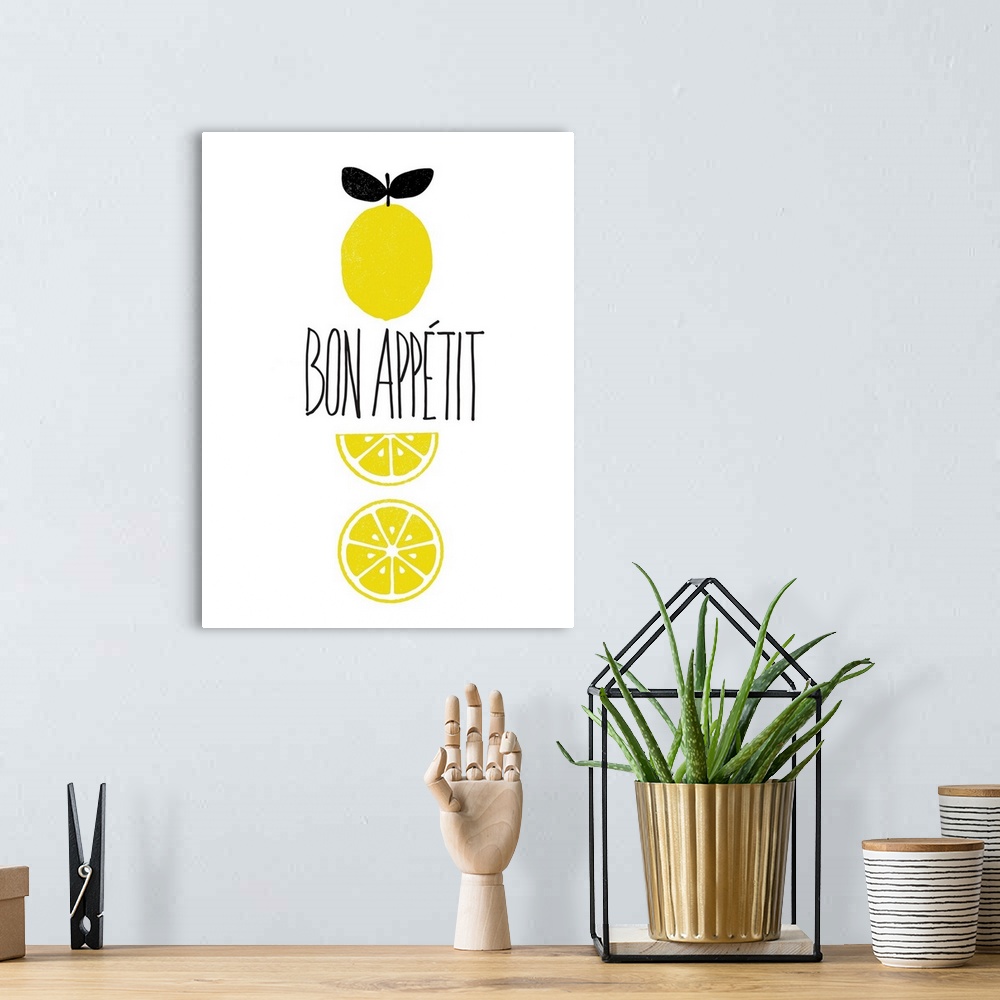 A bohemian room featuring "Bon Appetit" written in the center of a white background with illustrations of lemons.