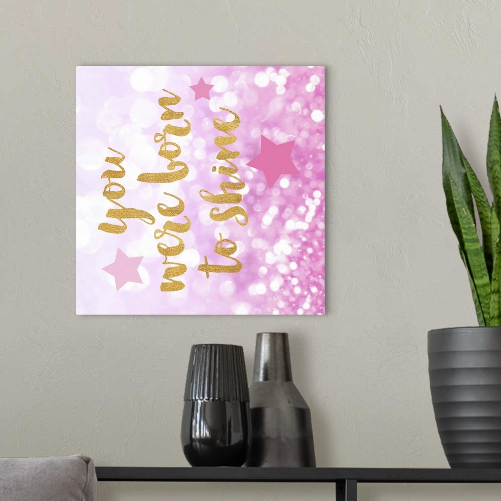 A modern room featuring "You were born to shine" on a glittery pink background.