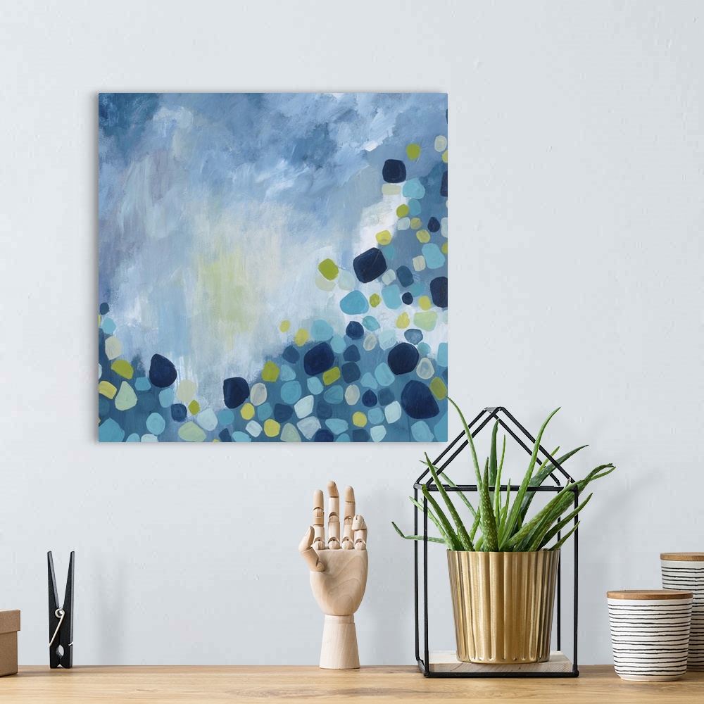 A bohemian room featuring Contemporary abstract painting using tones of blue with circular shapes in various repeating colo...