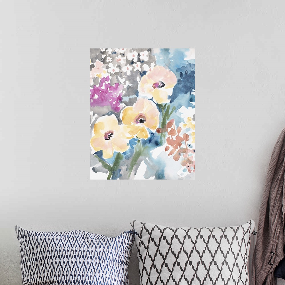 A bohemian room featuring Watercolor painting of a bouquet of yellow, pink, and blue flowers.