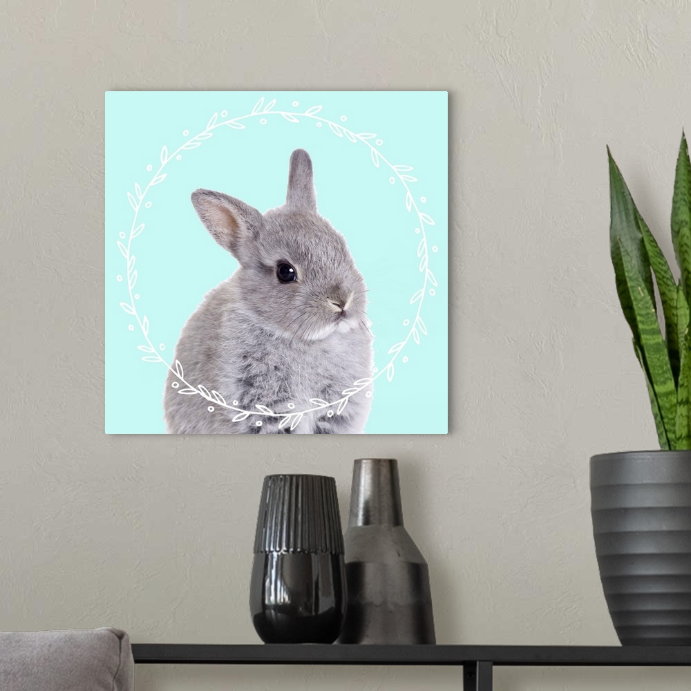 A modern room featuring Black and white photograph of a baby bunny on the middle of a light blue background with an illus...