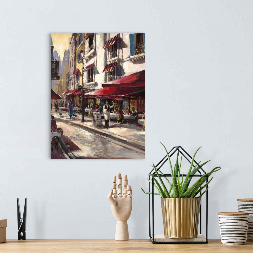A bohemian room featuring Contemporary painting of a city street with a waiter standing outside a cafe.