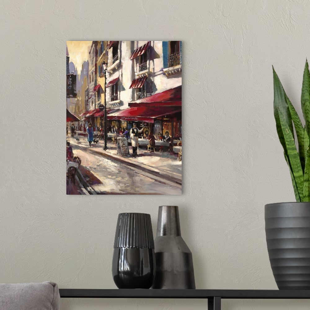 A modern room featuring Contemporary painting of a city street with a waiter standing outside a cafe.