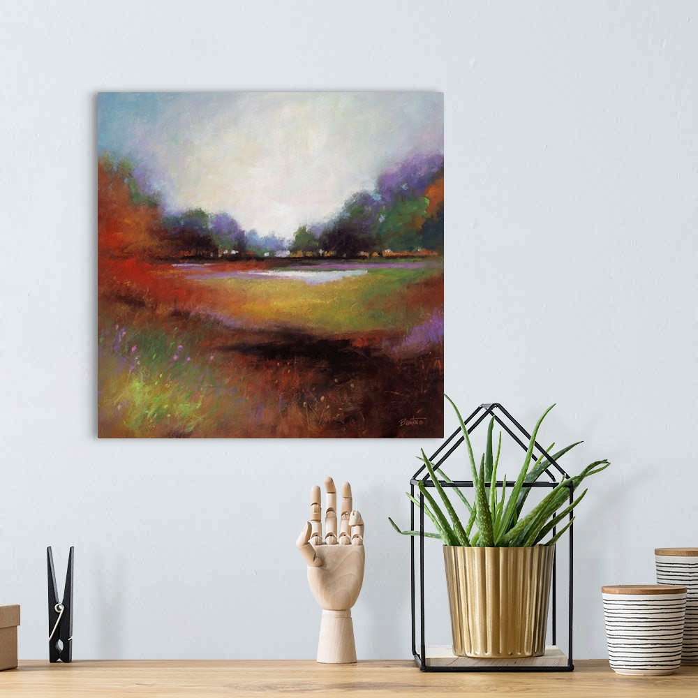 A bohemian room featuring Contemporary painting of a colorful and idyllic countryside landscape.