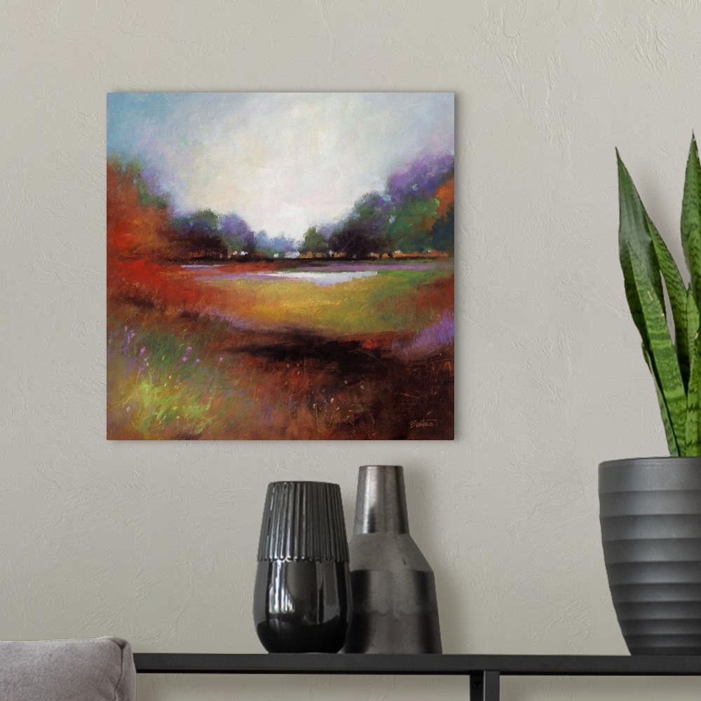 A modern room featuring Contemporary painting of a colorful and idyllic countryside landscape.