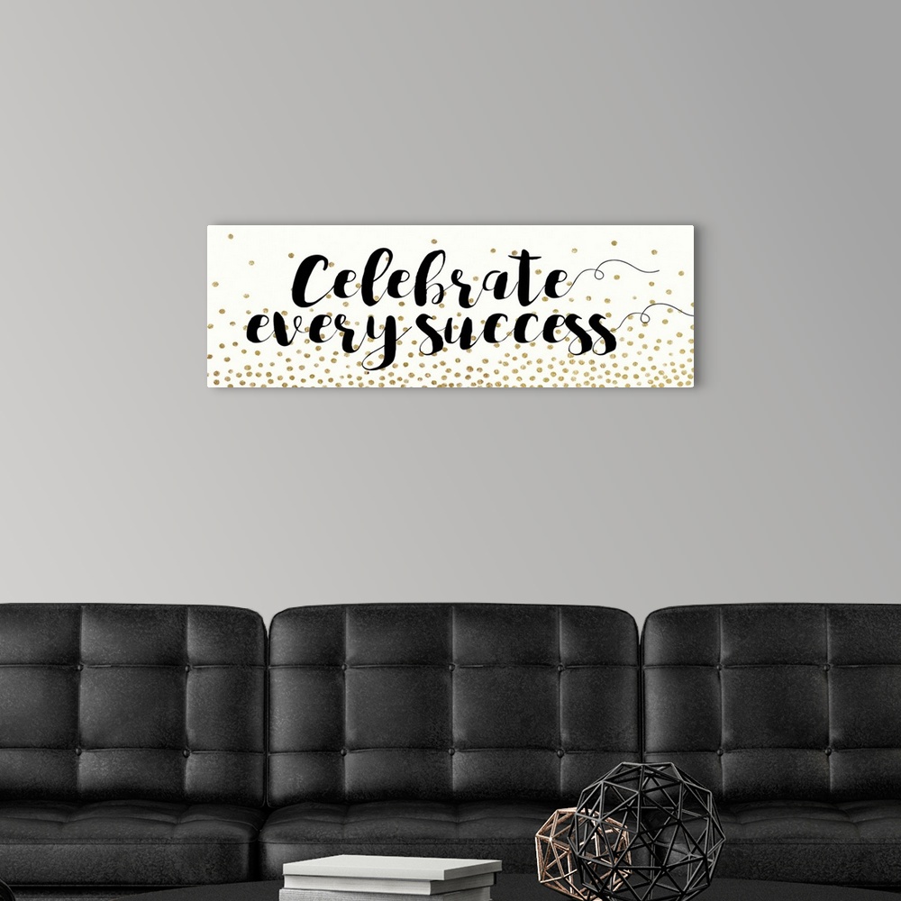 A modern room featuring Motivational sentiment in black calligraphy with gold dots.