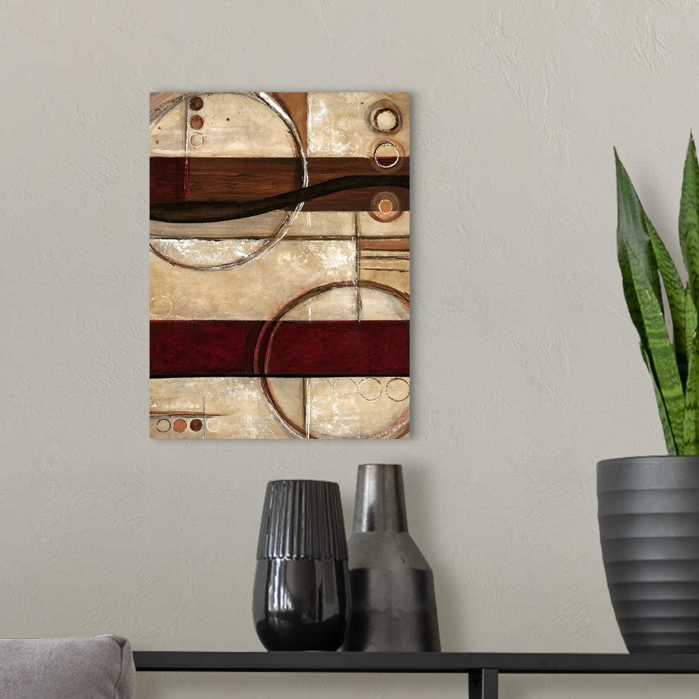 A modern room featuring Contemporary abstract home decor art work using warm earthy tones and rigid geometric shapes.