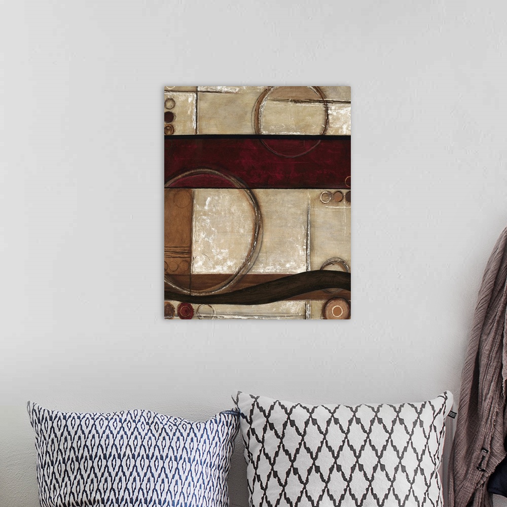 A bohemian room featuring Contemporary abstract home decor art work using warm earthy tones and rigid geometric shapes.