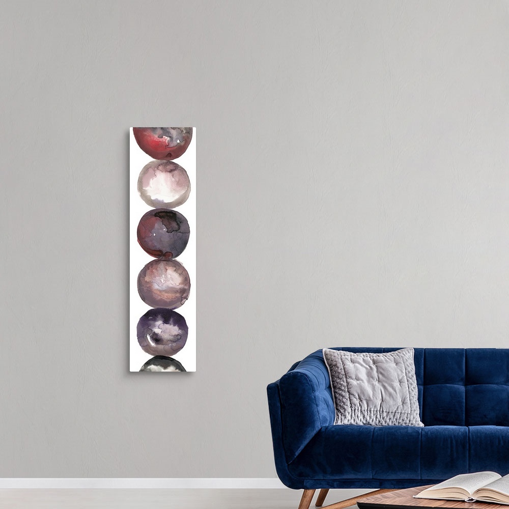 A modern room featuring Abstract artwork of a column of circular shapes in shades of grey and red.