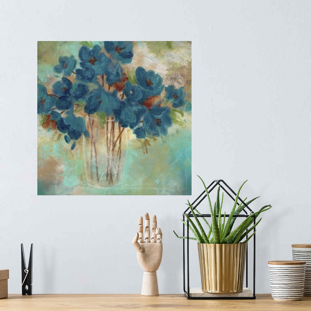 A bohemian room featuring Aqua toned painting of a bouquet of flowers in a glass vase.