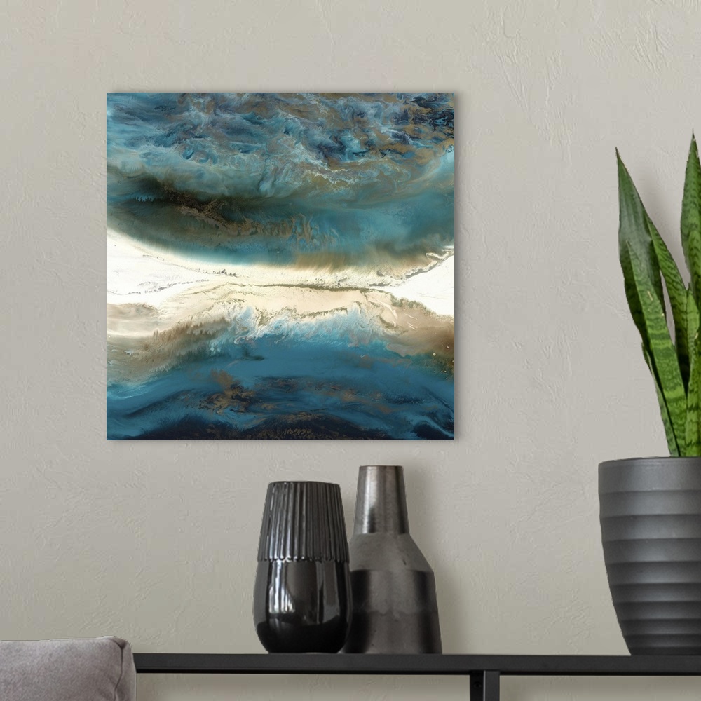 A modern room featuring Abstract painting in deep blue and light beige resembling an aerial view of the ocean and shore.
