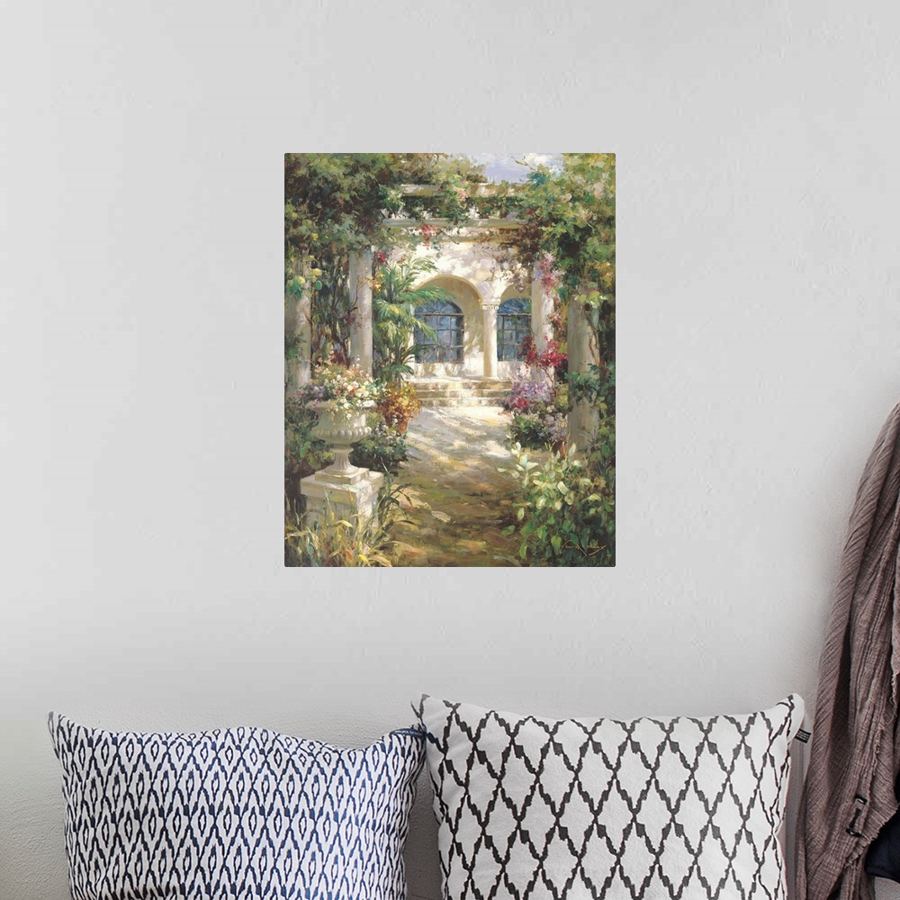 A bohemian room featuring Painting of a shady courtyard with arches and columns.