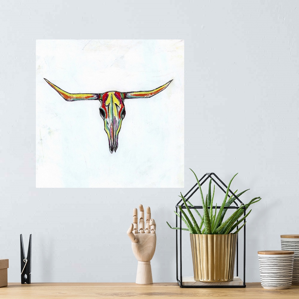 A bohemian room featuring Contemporary painting of a multi-colored cow skull with long horns.