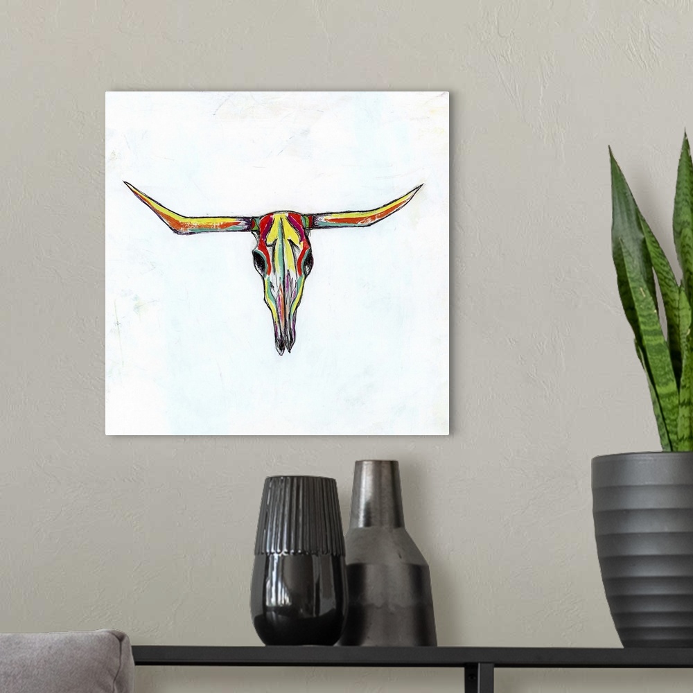 A modern room featuring Contemporary painting of a multi-colored cow skull with long horns.