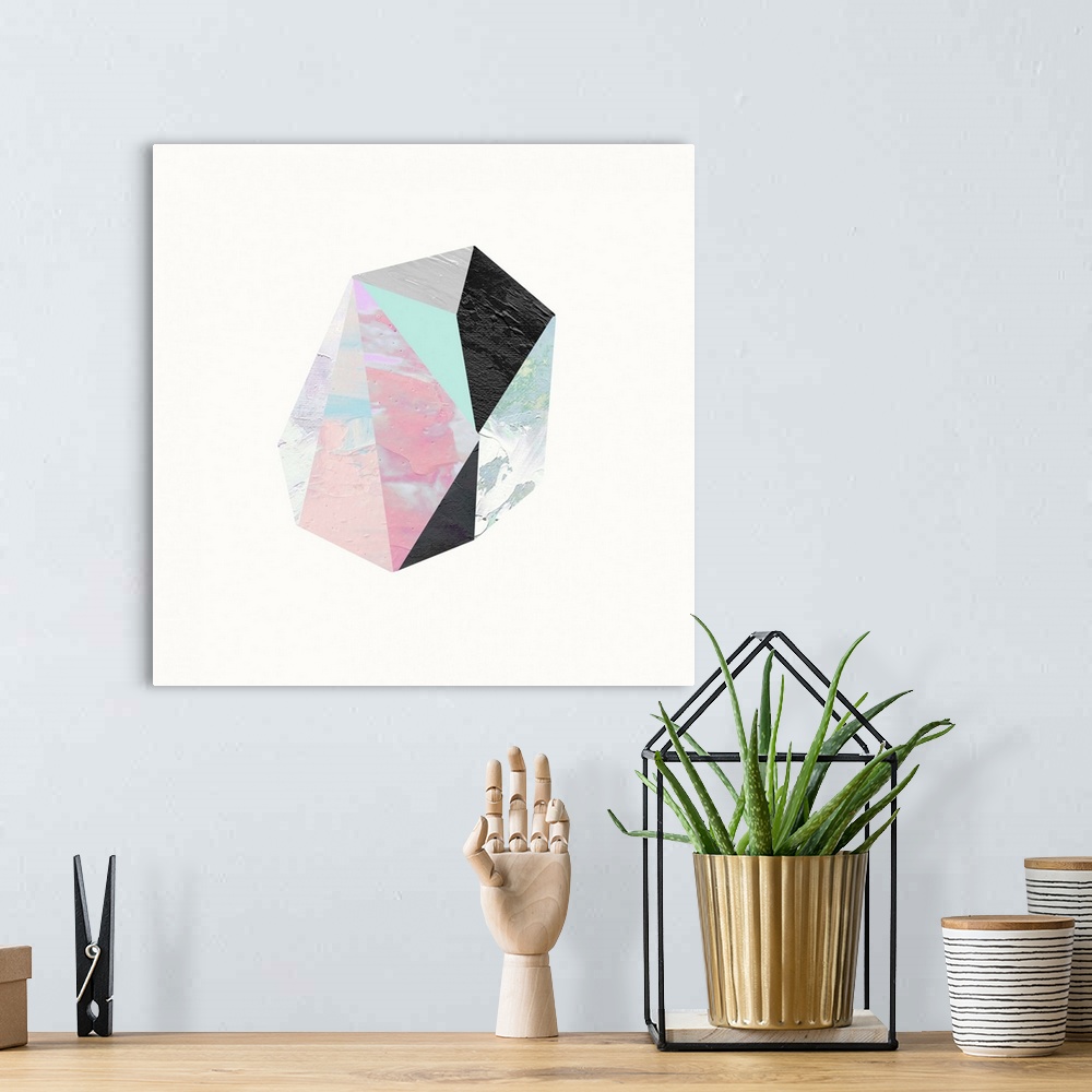 A bohemian room featuring Modern art of a faceted crystal shape in black, pink, and light blue on white.