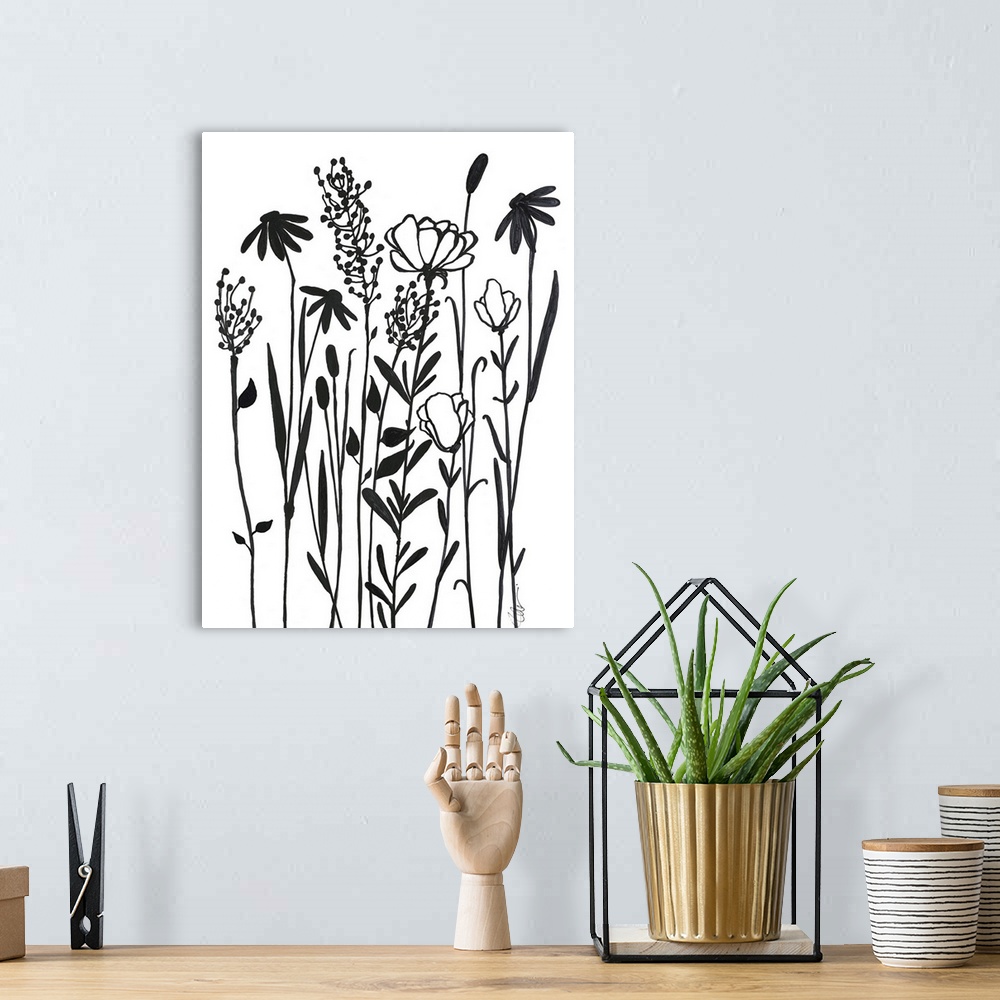 A bohemian room featuring Simple black and white illustration of long-stemmed flowers.