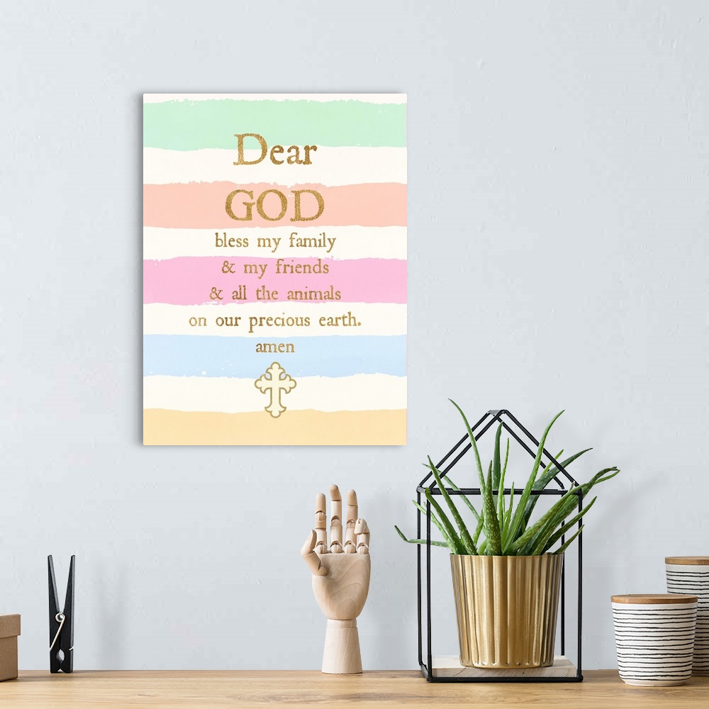 A bohemian room featuring Children's typography artwork of a prayer over pastel stripes.