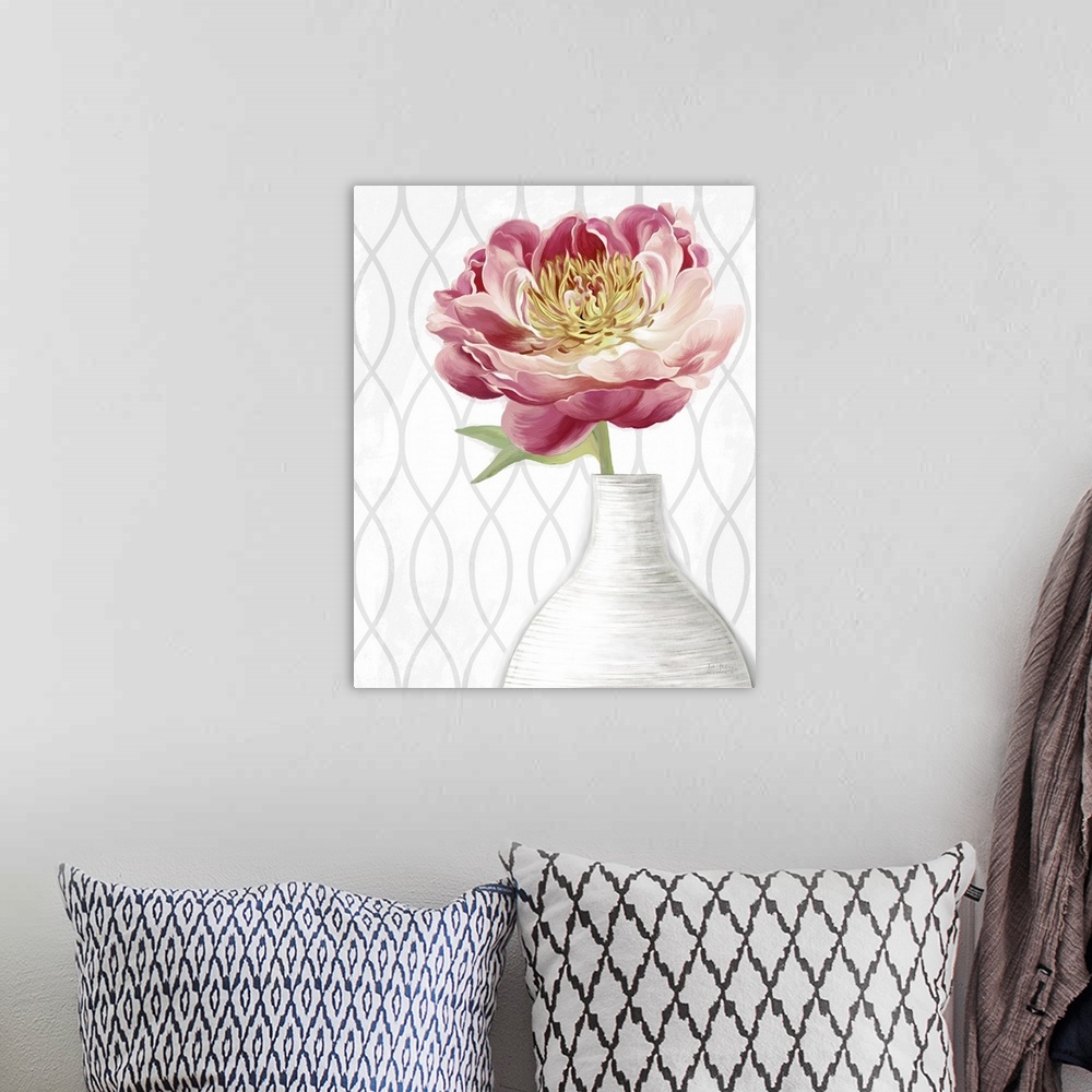 A bohemian room featuring Home decor artwork of yellow and pink peony's in a white vase.