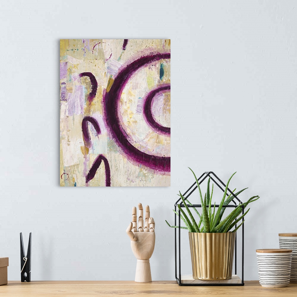 A bohemian room featuring Abstract artwork of dark purple curved lines on beige.