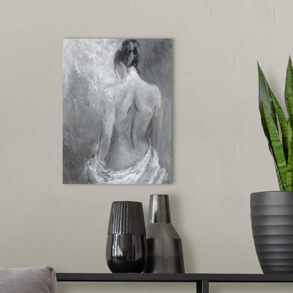 A modern room featuring Monochrome artwork of a nude female figure.