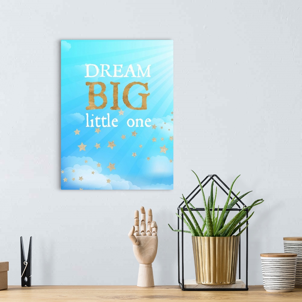 A bohemian room featuring Nursery artwork of golden stars in a cloudy blue sky with text.
