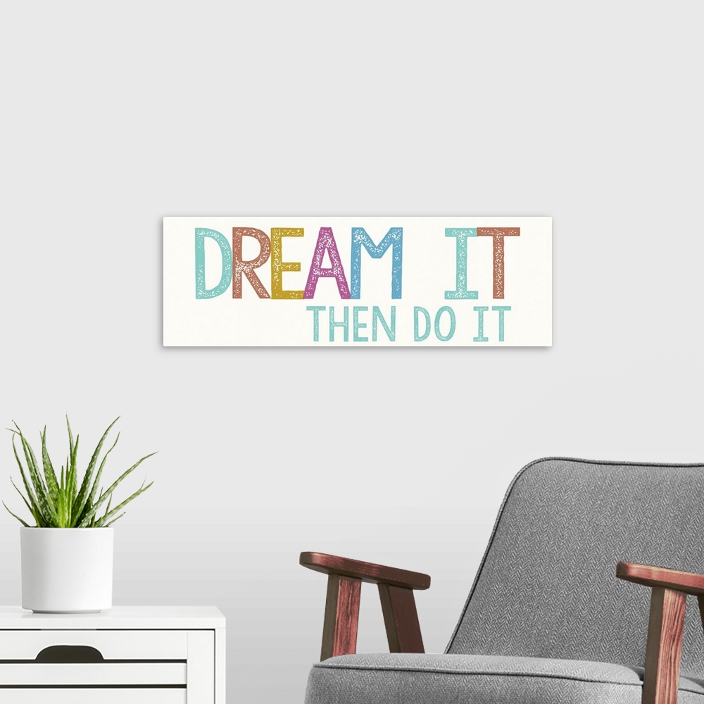 A modern room featuring "Dream it, then do it" in bold, colorful letters.