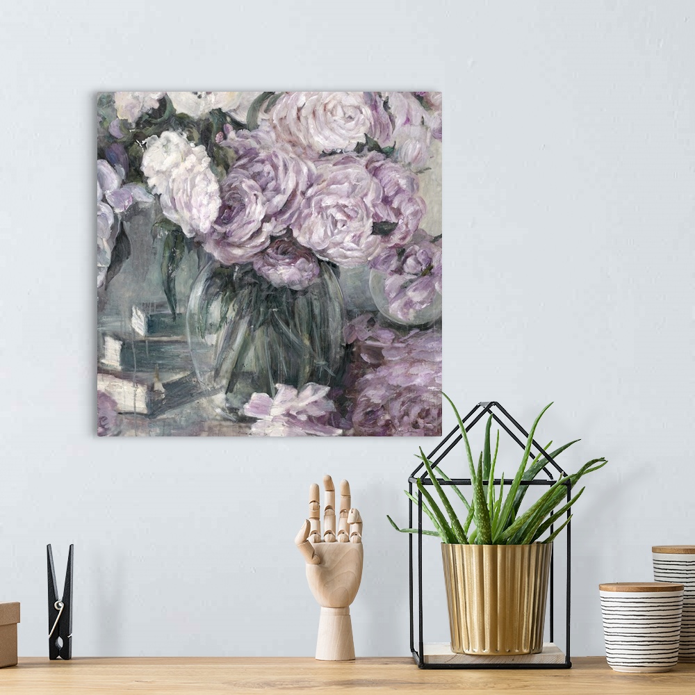 A bohemian room featuring Classic-style artwork of a bouquet of lavender roses in a glass vase.