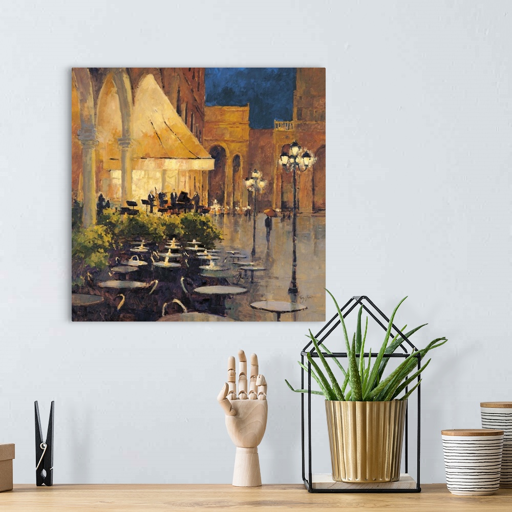A bohemian room featuring Contemporary painting of a cafe with empty outdoor seating.
