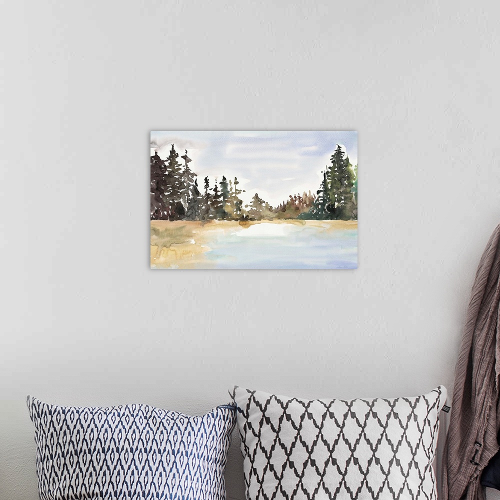 A bohemian room featuring Watercolor landscape painting of a lake with trees along the edge.