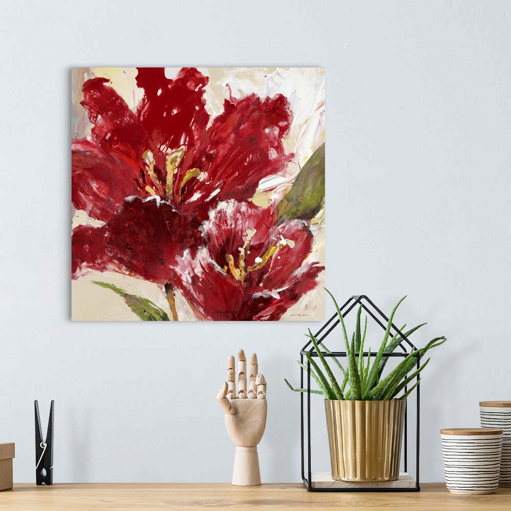 A bohemian room featuring Contemporary painting of vibrant red tulip flowers.