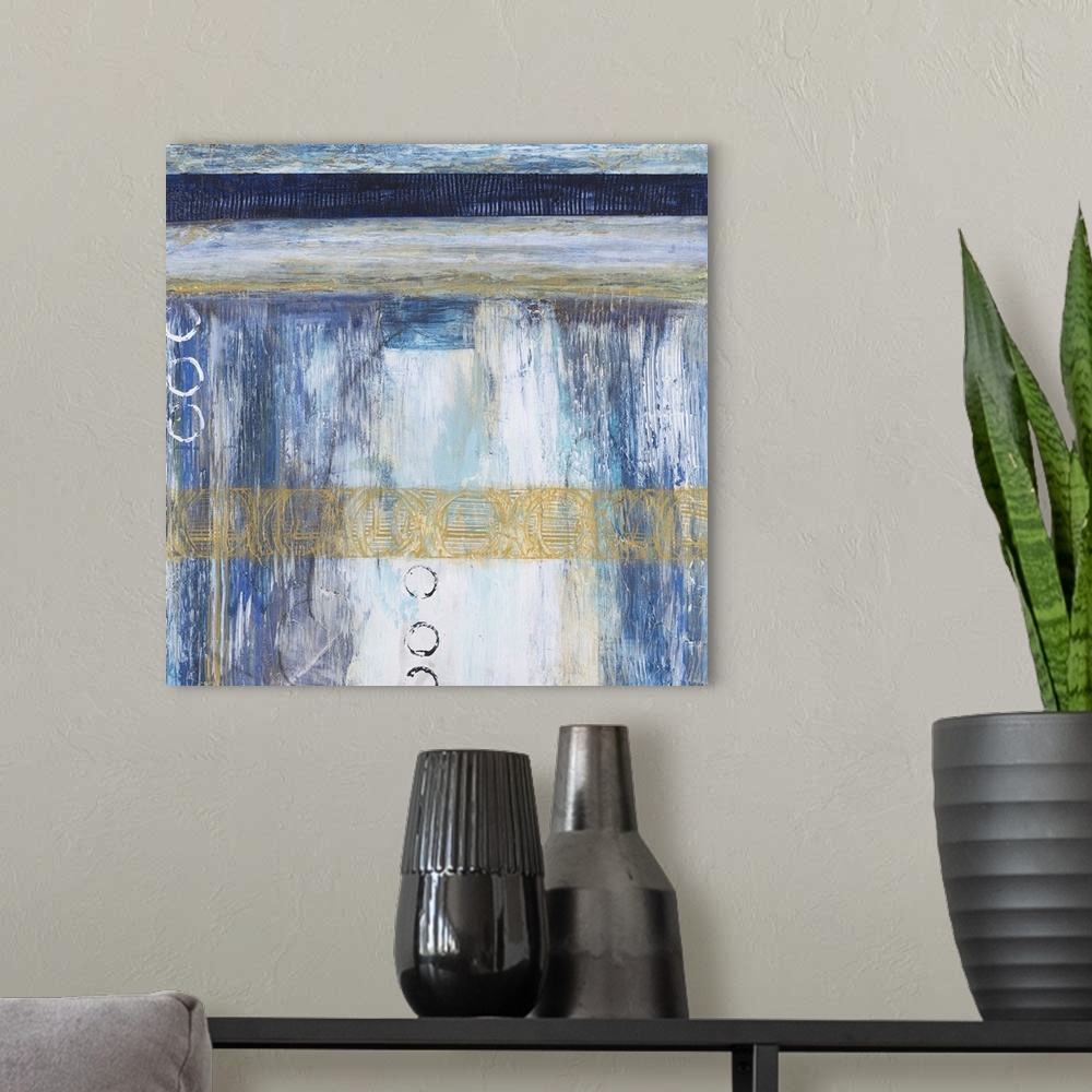 A modern room featuring Contemporary abstract painting using blue and neutral tones with hints of gold.