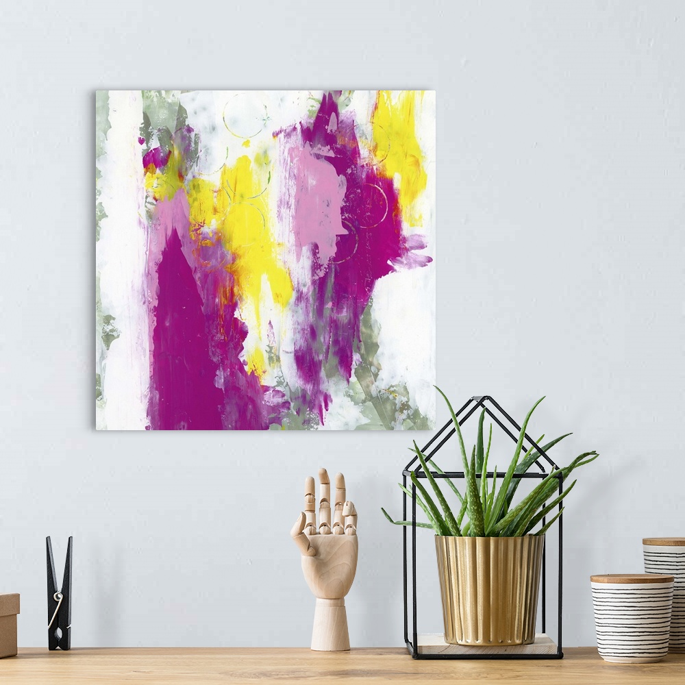 A bohemian room featuring A contemporary abstract painting using splashes of bright pink and purple tones against a predomi...